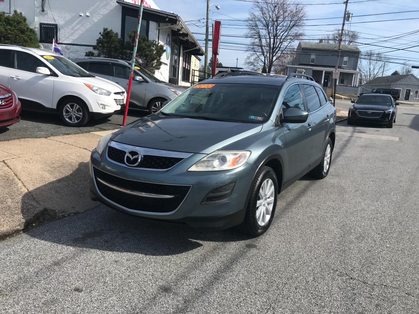 2010 Green /Black Mazda CX-9 Grand Touring (JM3TB3MV7A0) with an 3.7 V6 engine, Automatic transmission, located at 577 Chester Pike, Prospect Park, PA, 19076, (610) 237-1015, 39.886154, -75.302338 - Photo#2